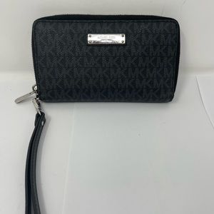 Michael Kors monogram clutch/wristlet